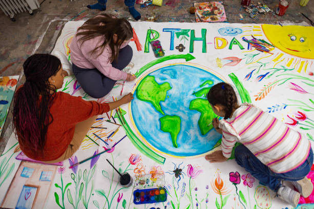 istock Children and Teacher Drawing for Earth Day 2195362461