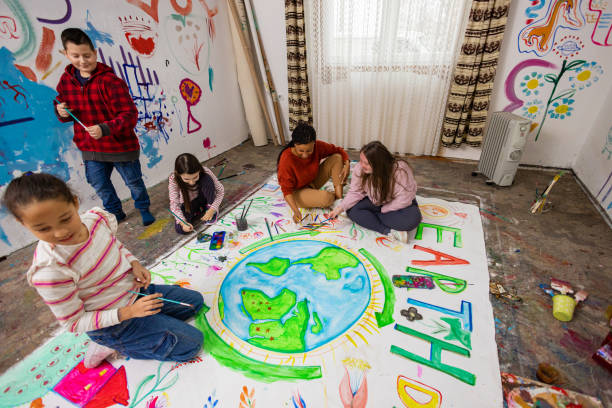 istock Diverse Kids Drawing for Earth Day 2195362782