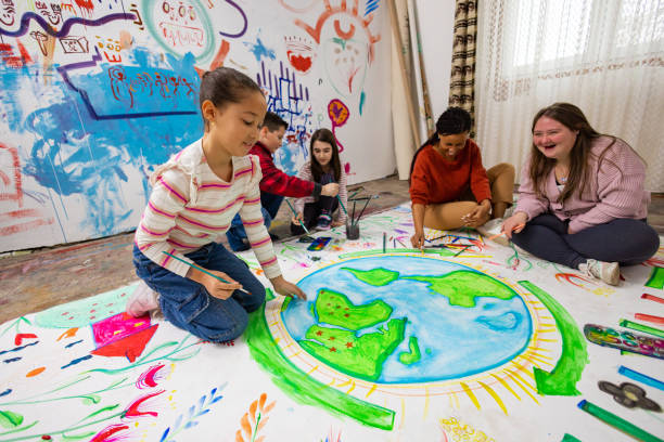 istock Children Collaborate on Earth Day Poster 2195362860