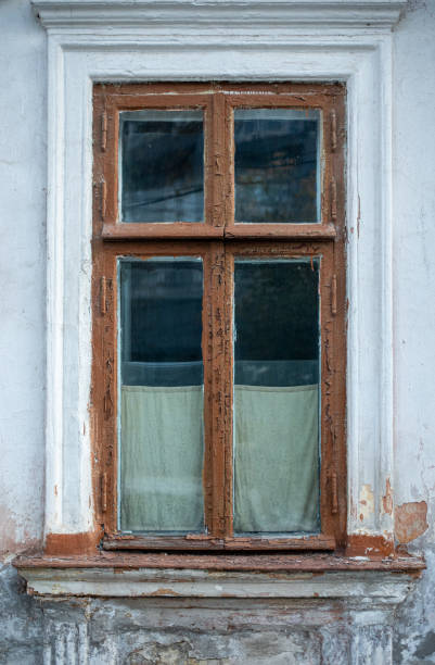 istock Old vintage wooden window on old house 2195365174