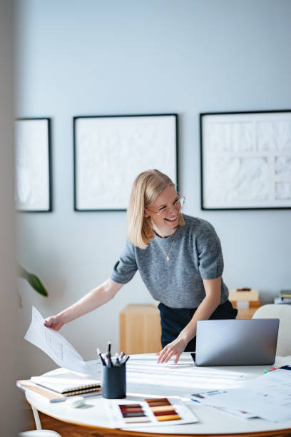 istock Young Businesswoman Conducting Creative Work in a Contemporary Design Studio Setting 2195365561