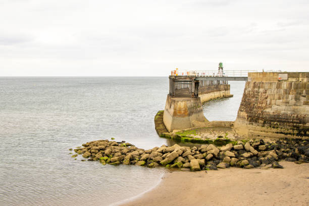istock A Curved Sea Wall Creating A Unique And Interesting Feature That Is Enjoyable To Look At 2195373335