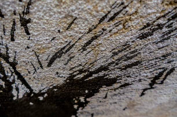 istock A wall with black and white paint splatters 2195383795