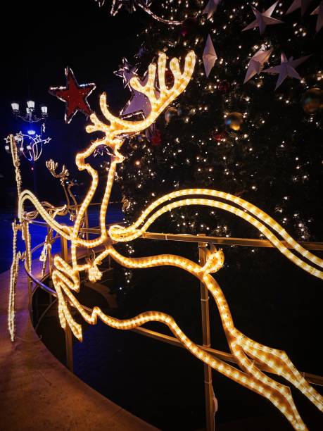 istock Christmas deer decorating the Christmas tree 2195386279
