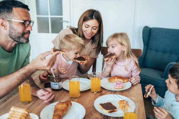 istock Happy family having breakfast 2195389042