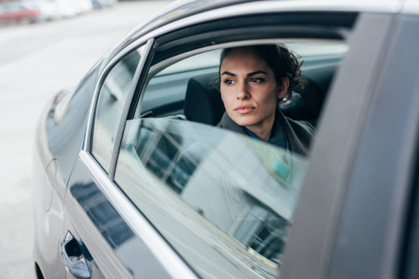 istock Woman looking through the car window 2195389050