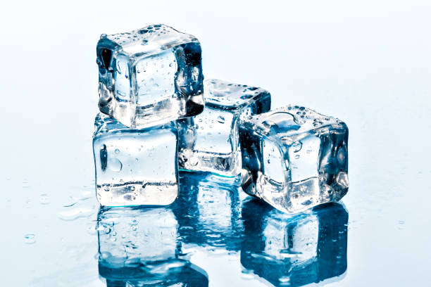 istock ice cubes on white background. creative photo. 2195391664