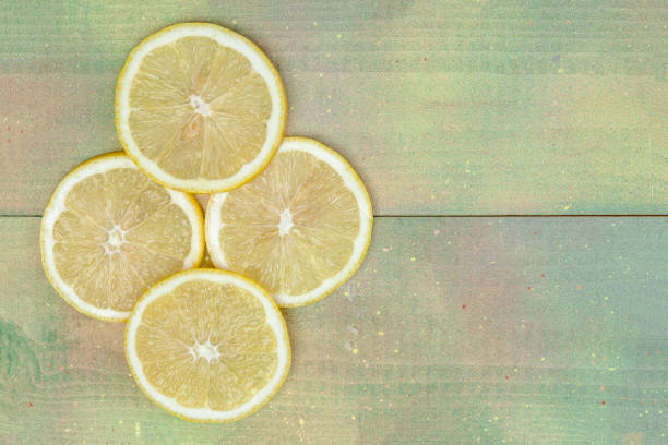 lemon slices on wooden table