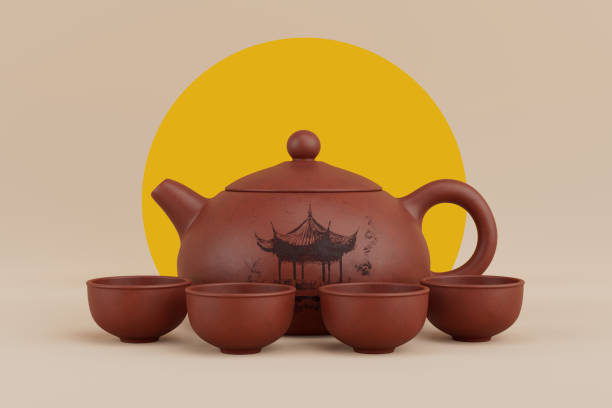 istock Chenese Clay Tea Set with Teapot and Cups on a Sunrise Background. 3d Rendering 2195397303