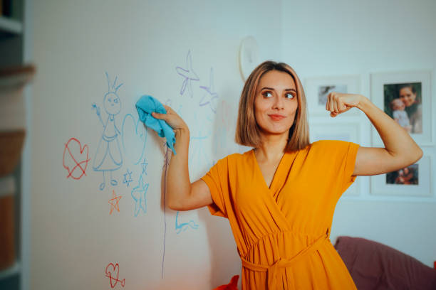 Strong Mom Washing Wall Written on by her Kids