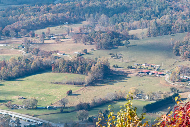 Scenic landscape shot from north Georgia mountaintop shows idyllic rural valley below