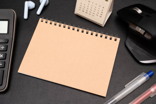 istock Blank Notebook with calculator and office supplies. Copy space for text. Place for an inscription, business concept. 2195404105