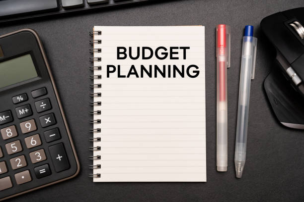 istock BUDGET PLANNING text on Notebook with calculator and office supplies. Budget planning concept 2195404132