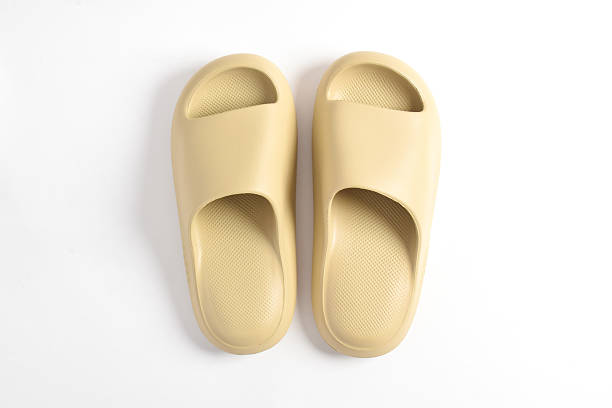 istock A pair of rubber slippers on white background 2195405680