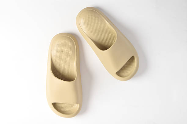 istock A pair of rubber slippers on white background 2195405691