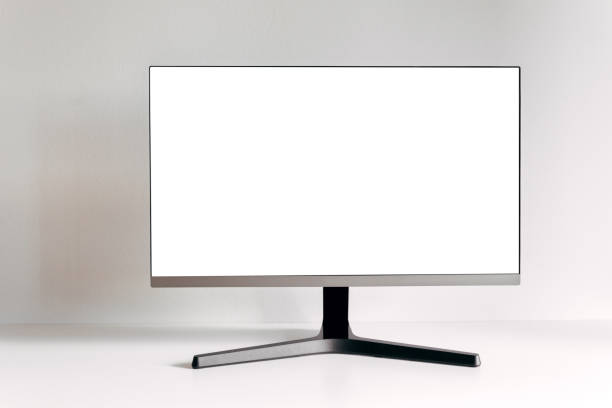 istock A black computer monitor on a white table. Mock up for design, teplate. Stylish minimalist interior. Gray background. 2195405881