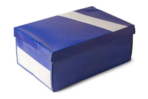Cardboard boxes on a blue background. Moving. Containers for packing things. Boxes for cargo transportation. Moving household goods.