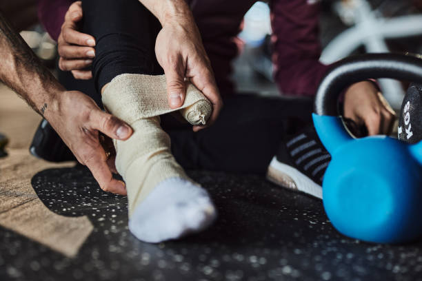 istock Bandaging an injured ankle! 2195419540