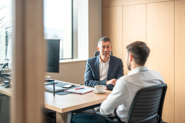 istock Collaborative Business Meeting in Modern Office 2195421380