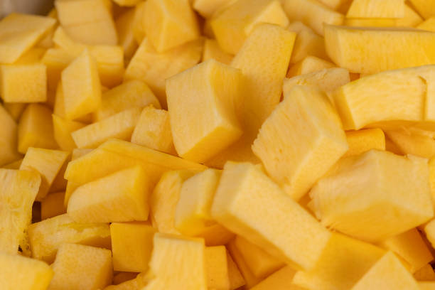 istock orange pumpkin fruit details cut into pieces for cooking 2195421762