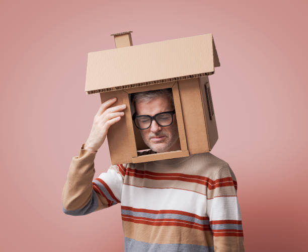 istock Worried man thinking about his house 2195428266