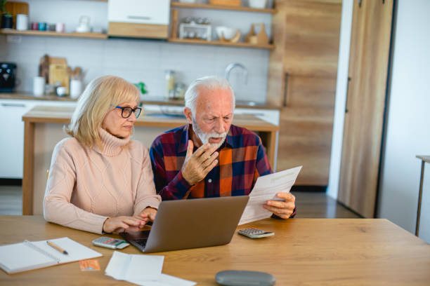 istock Senior couple problem with household finances and bills 2195428362