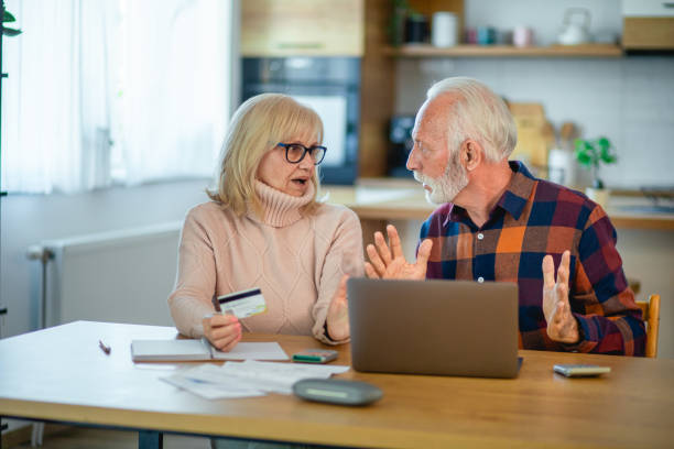 istock Worried seniors calculating household budget 2195429453