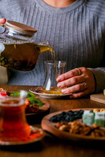 istock Enjoying a relaxing tea time with snacks in a cozy setting 2195434927