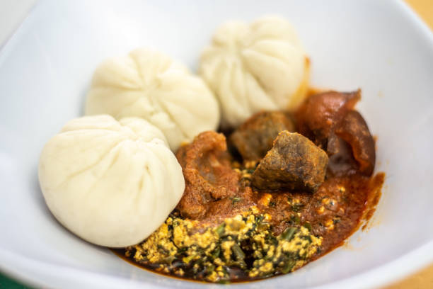 istock Pounded yam, Vegetable soup and stew with liver and pommo 2195435141