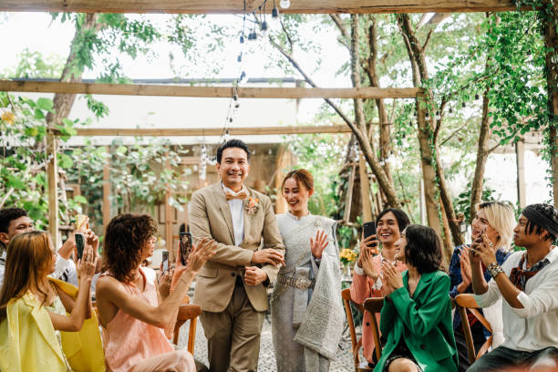 istock Father Walking Bride Down the Aisle During Thai Wedding Ceremony 2195437386