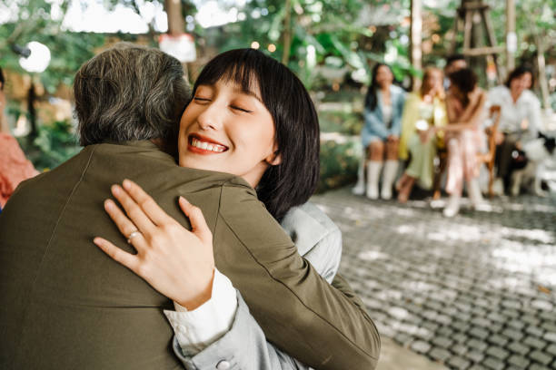istock Emotional Family Moment Captured During Joyful Thai Wedding Ceremony 2195437390