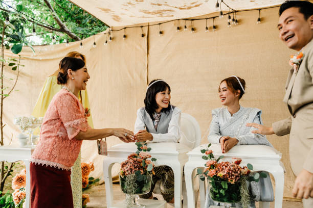 istock Outdoor Thai Wedding Ceremony with Smiles, Traditions, and Elegant Decor 2195437478