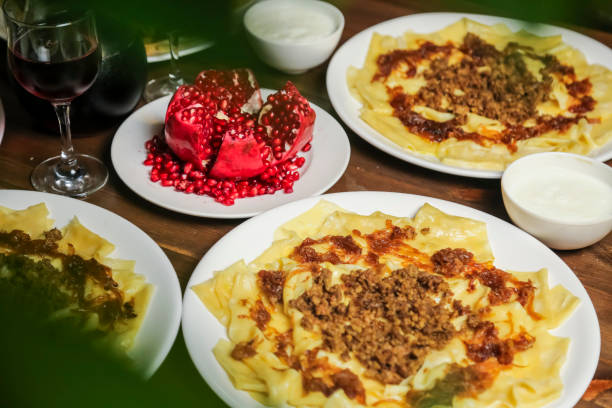 istock Delicious traditional dish served with pomegranate and yogurt 2195438494