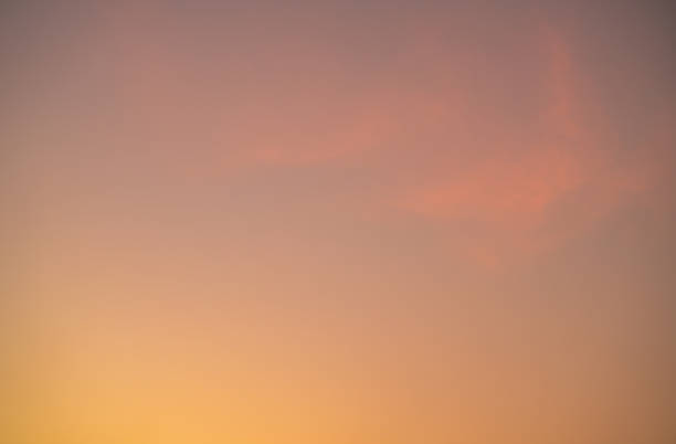 istock Vibrant orange sunset sky creating a serene and tranquil atmosphere, ideal for climate and environmental concepts or as an emotional and psychological design background, evoking warmth and creativity. 2195441440