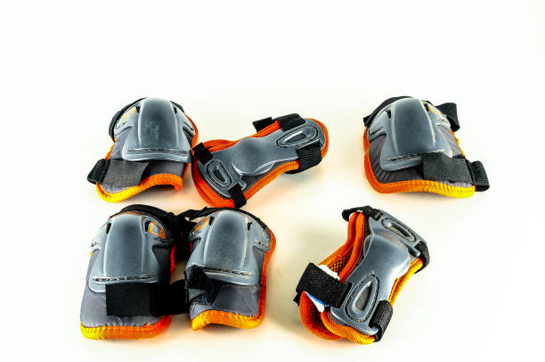 istock A row of knee pads are lined up on a white background 2195441509