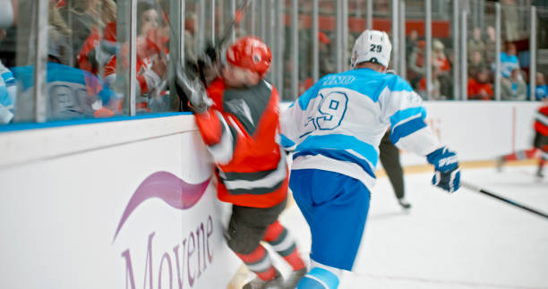 istock Intense Ice Hockey Collision on Rink 2195443890