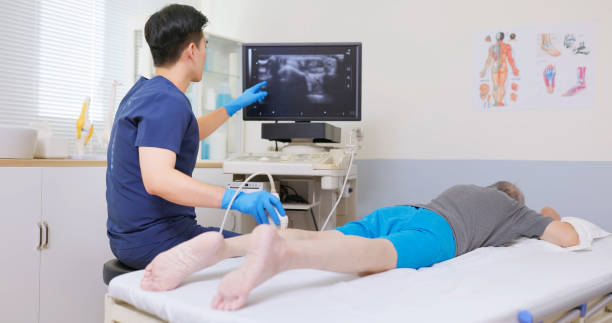 istock asia Doctor Perform calf Ultrasound 2195445093