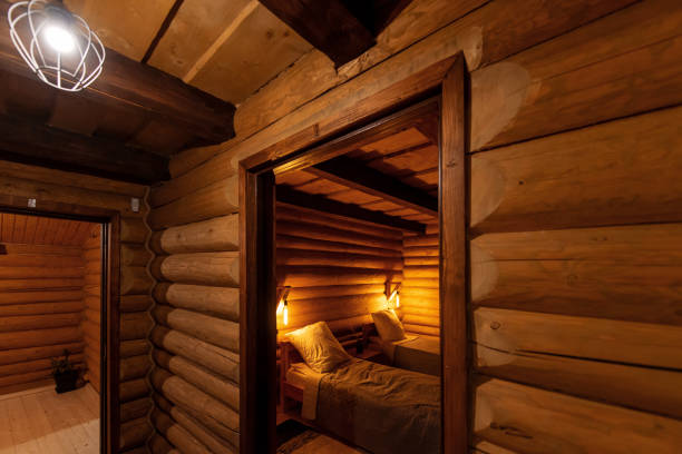 istock Cozy Wooden Cabin Interior with Warm Lighting 2195450674