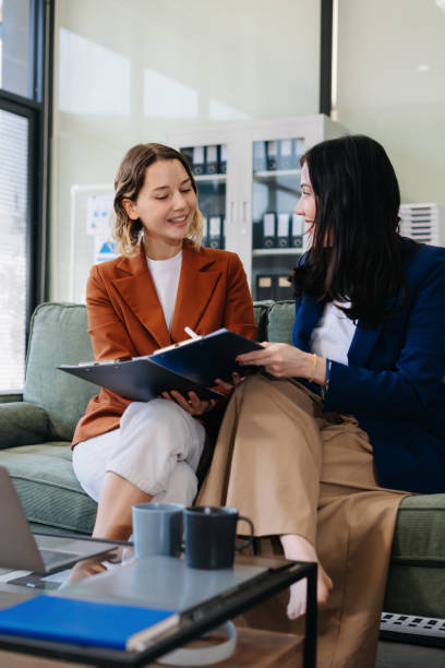 istock Diverse Business Team Discusses Financial Project Analysis in Meeting. 2195458603