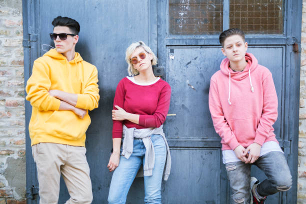 istock Group of young adults spending time outdoors 2195459811
