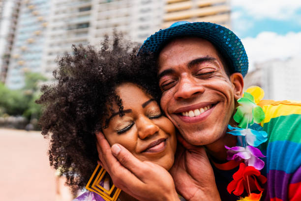 istock Friends having fun at the street carnival 2195460596