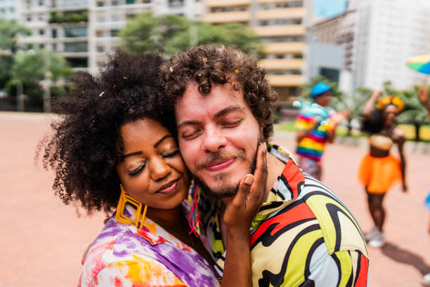 istock Friends having fun at the street carnival 2195460598
