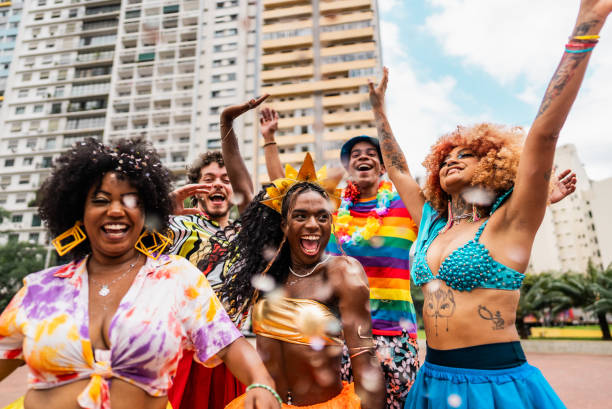 istock Friends dancing at the street carnival 2195460754