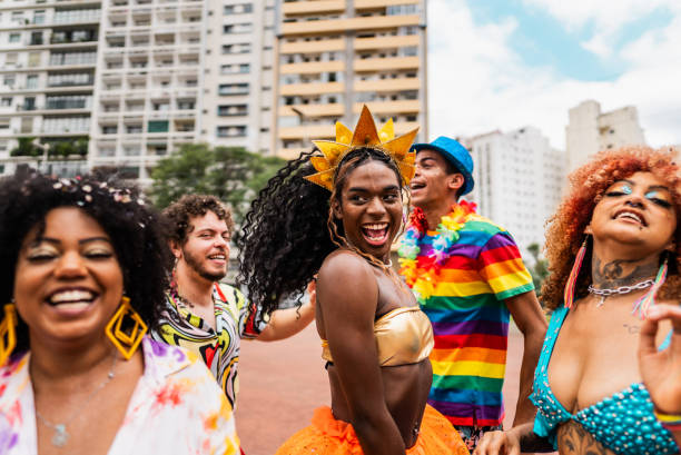 istock Friends dancing at the street carnival 2195460767