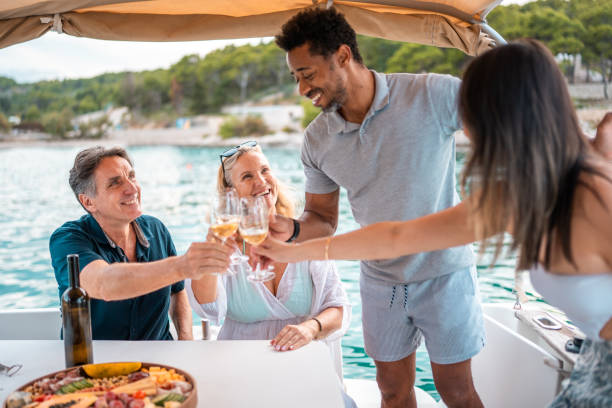 istock Diverse Friends Enjoying Wine on a Boat 2195460852