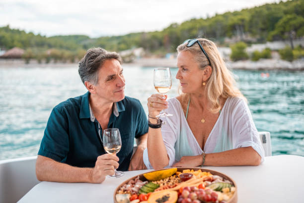istock Mature Couple Enjoys Wine on Adriatic Coast 2195460860