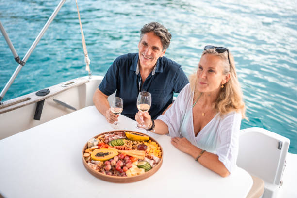 istock Mature Caucasian Couple Dining on a Boat 2195460889