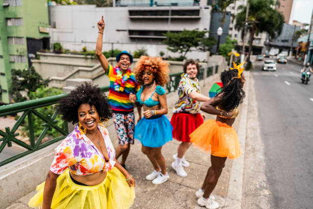 istock Friends dancing at the street carnival 2195461085