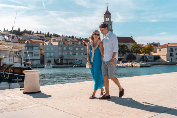 istock Mature Caucasian Couple Strolling Adriatic Town 2195461441