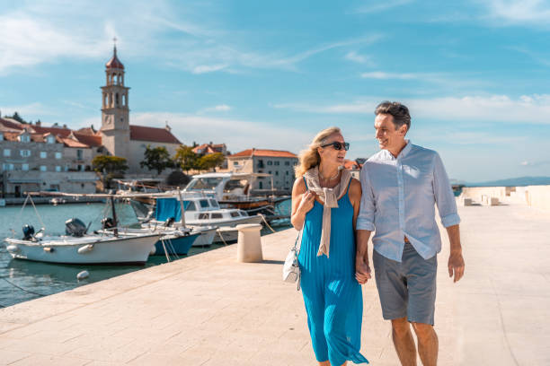 Mature Caucasian Couple Strolling Adriatic Coast